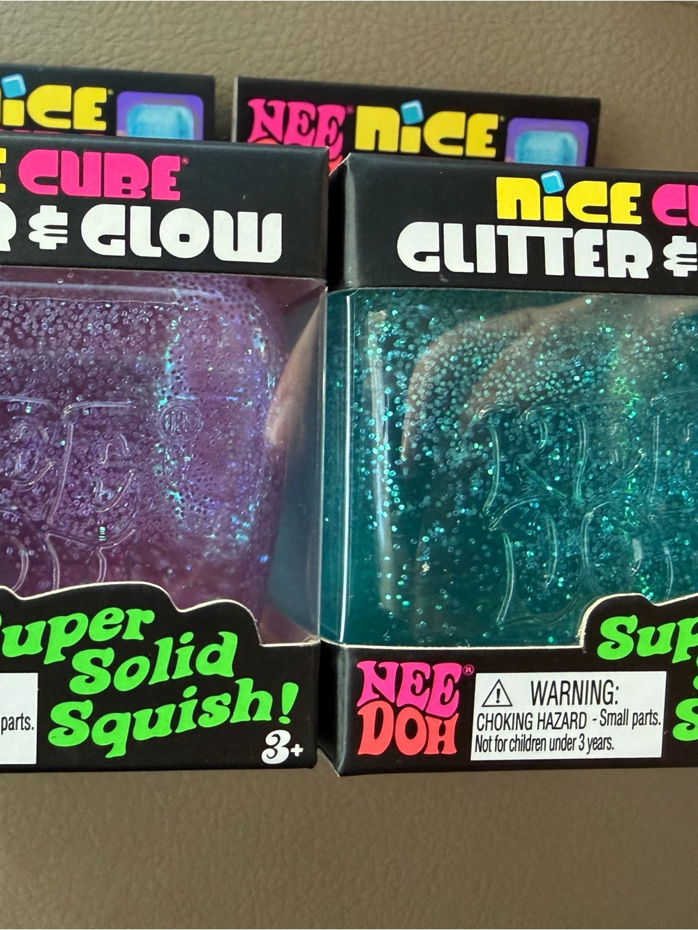 Nee doh Glitter & Glow Super Solid Squish Toy - blue and purple bundle